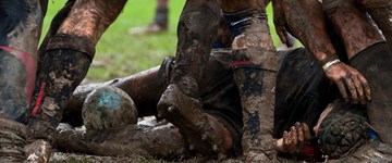Rugby Game And Very Dirty Rugby Players